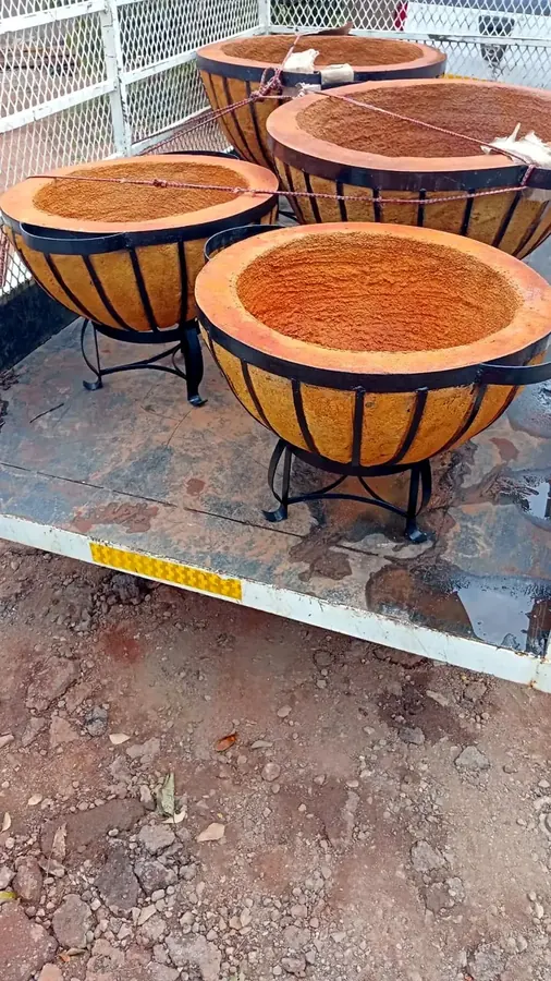 Four finished Motse boma braai bowls loaded onto a trailer, ready for delivery.